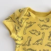 Kép 2/2 - Mustársárga dínós pamut kisfiú body – Primark, 56-os méret