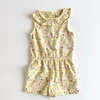 Kép 1/2 - Pasztellsárga virágos playsuit fodros nyakkal – Mothercare, 98-as méret