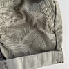 Kép 2/2 - khaki levélmintás pamutvászon fiú short 3–6 hónapos babáknak