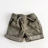 Kép 1/2 - khaki levélmintás pamutvászon fiú short 3–6 hónapos babáknak