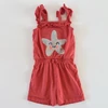 Kép 1/2 - paprikapiros pamut playsuit flitteres mintával 4–5 éves kislánynak