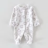 Kép 1/2 - 50-es Next macis pamut unisex rugdalózó fehér alapon lila mintával