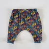 Kép 1/2 - 56-os Next virágmintás baba leggings csipkés szegéllyel – újszülött
