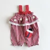 Kép 1/3 - Kockás pamutvászon kislány playsuit hímzett katicával – 80