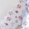 Kép 2/2 - 62-es Next virágmintás hosszú ujjú pamut kislány body