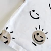 Kép 2/2 - Next fehér pamut kisfiú póló smile mintákkal, 68-as méret