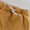 Kép 2/2 - 74-es Next okker kisfiú jogger melegítőnadrág – 6-9 hónap