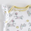 Kép 2/2 - 74-es Mothercare kislány pamut napozó unikornis mintával és fodros vállal