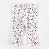 Kép 1/2 - 74-es virágmintás pamut kislány leggings masnival – George