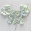 Kép 1/2 - Világoskék virágmintás Zara pamut crop top 8 éves kislánynak