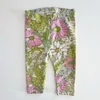 Kép 1/3 - 80-as Next mintás pamut kislány leggings – cicás és virágos minta