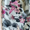 Kép 2/3 - Virágos, papagájos mintás nyári lány jumpsuit pántos fazonban, H&amp;M, 140-es méret