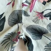 Kép 3/3 - Virágos, papagájos mintás nyári lány jumpsuit pántos fazonban, H&amp;M, 140-es méret