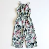 Kép 1/3 - Virágos, papagájos mintás nyári lány jumpsuit pántos fazonban, H&amp;M, 140-es méret