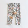 Kép 1/2 - Next virágos pamut leggings, használt babaruha, 80-as méret