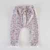 Kép 3/4 - Nutmeg masnis kislány leggings – virágos, csipkés, 86-os, használt babaruha