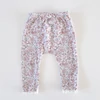 Kép 1/4 - Nutmeg masnis kislány leggings – virágos, csipkés, 86-os, használt babaruha
