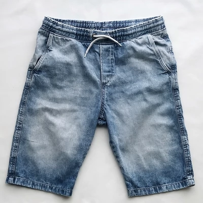14+ méretű, koptatott világoskék színű puha farmer anyagú H&amp;M-es jogger fiú rövidnadrág.