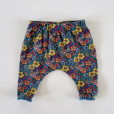56-os Next virágmintás baba leggings csipkés szegéllyel – újszülött
