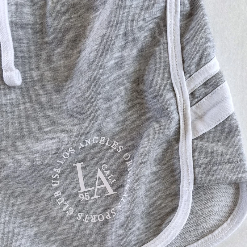 Sportos szürke nyári kislány playsuit vékony pánttal – New Look, 146