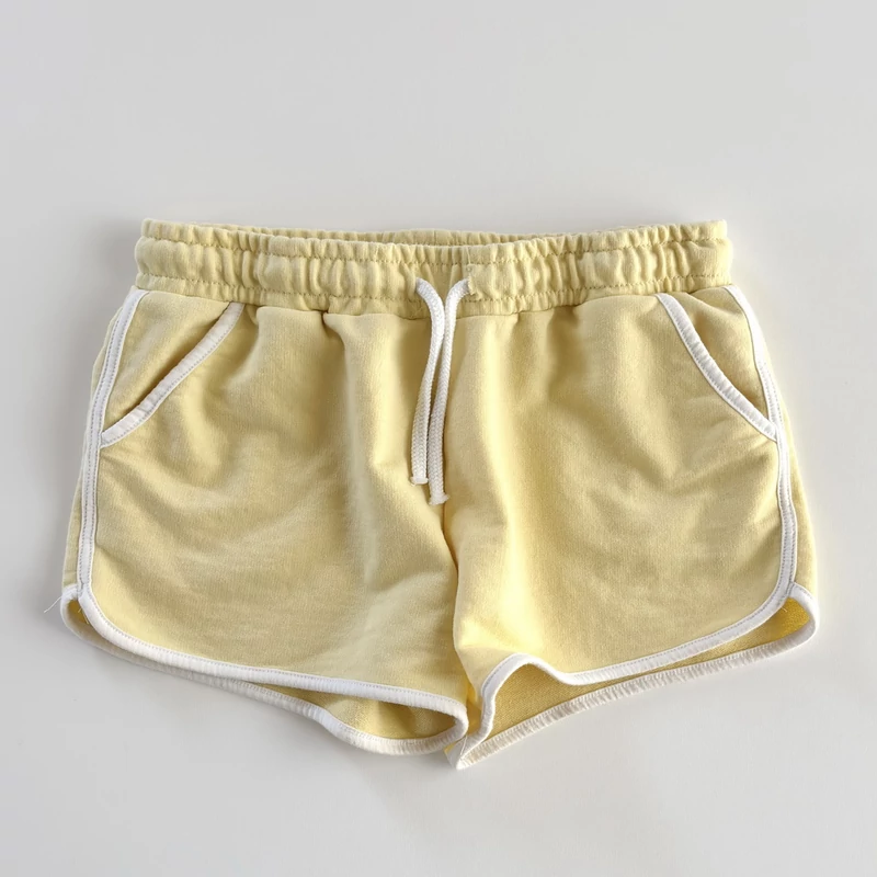 Halványsárga tinilány short fehér szegéllyel – Primark, 158