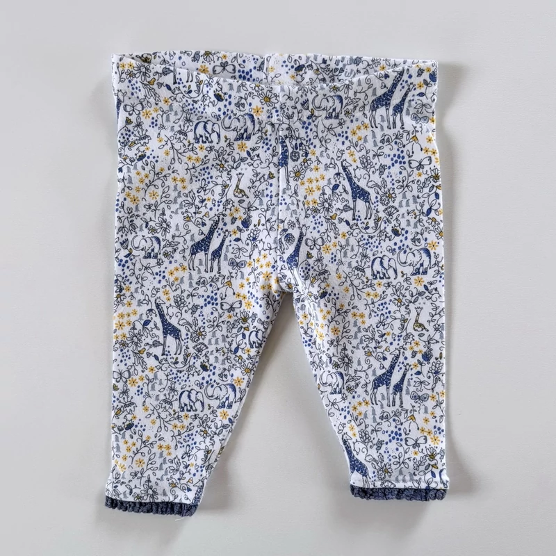 62-es Next mintás kislány pamut leggings csipkével – 0-3 hónap