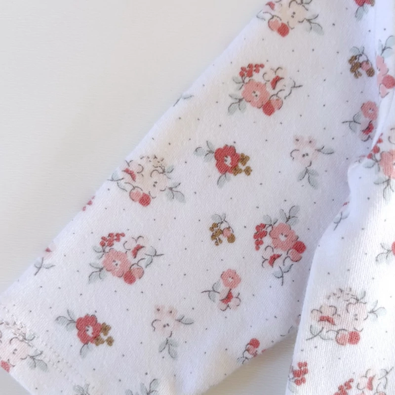 62-es Next virágmintás hosszú ujjú pamut kislány body