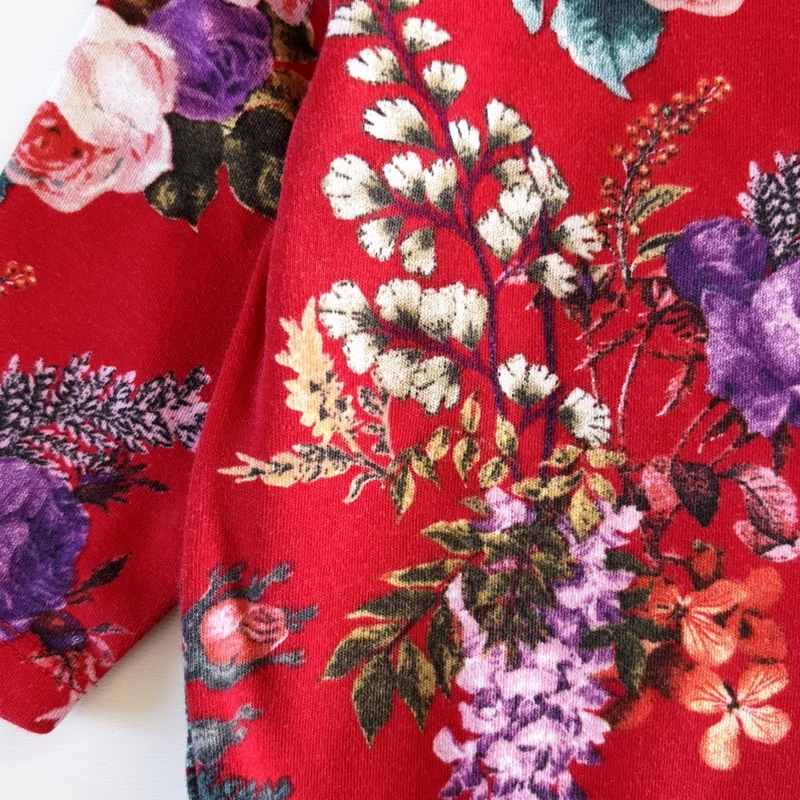 68-as Next virágmintás hosszú ujjú pamut kislány body