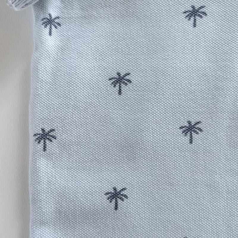 80-as H&amp;M világoskék pálmafa mintás galléros póló kisfiúnak